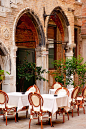  Outdoor Cafe in Venice , Italy