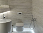 1-comiche-eclairage-indirect-dans-la-salle-de-bain-moderne-avec-mur-en-marbre-gris