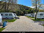 Caravan Camping Site, Caravans in a Camp Site, Relaxing Campsite in nature, Travel Trailers, Trailer park, Summer Camp. Stock Photo