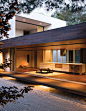 Outdoor view of living room and kitchen clad in ipe wood: 