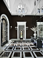 This mesmerizing black and white hallway was completed by Salcito Custom Homes. #luxeAZ