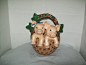 Ceramic Pigs In A Basket Planter Hand Crafted Vintage PIece : This is a sweet planter basket with two sweet piglets peeking over the edge. Adorable estate treasure.  This measures 8 1/2 inches tall X 8 inches wide X 4 1/2 inches deep  Some scuffs and litt