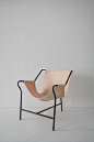 Tres pes armchair by designer Lina Bo Bardi. Available at Espasso