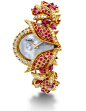 Watch by Piaget - rubies and diamonds set in yellow gold