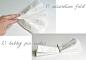 制作方法：
1、折叠成手风琴的样式（4层）
2、用发卡固定纸巾中间
