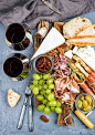 Cheese and meat appetizer selection or wine snack set. Variety of  cheese, salami, prosciutto,...