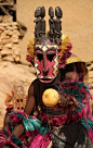 Dogon dancer shaking a musical calabas, in Tirelli, Mopti, Mali ~ by Raphael Bick