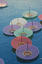 hiroshima umbrellas by manthatcooks on Flickr.Via Flickr:<br/>It was the 60th Anniversary of the bombing of Hiroshima yesterday. This was taken on the 50th. The river that the umbrellas are floating peacefully on was used by the victims to try to co