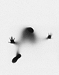 Ghostly Hands and Feet Photographed Through Milk Glass by Marek Chaloupka silhouettes black and white: 