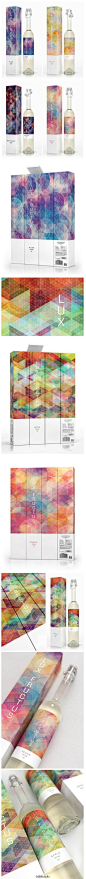 [【广告设计】Lux Fructus果酒概念包装，美！] 设计师Marcel Buerkle受另外一个叫Simon C的设计师的CUBEN iPad视网膜屏壁纸设计的灵感启发，并采用了其中的设计图案，令人拍案的是图形色彩的搭配，以及果酒类型与图形的色彩搭配选择。
