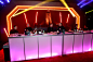 <p> An illuminated bar front underscored the overall glowing look and feel of the party.</p>