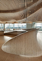 One Main Office Renovation - Wooden Sculpture: This penthouse office of an investment group in green building and clean energy technologies (CChange) was inspired from the architect's prior sculpture - In the shadow of Ledoux in 1993. The interior element