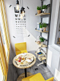Vertical storage - here and inside the main room - is key to making a small space like this work.: 
