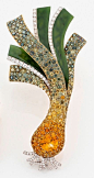A diamond, sapphire, jade and 18K gold brooch by Lorenz Bäumer.