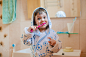 A little girl is brushing her teeth. A child in a bathrobe in the bathroom washes. by Yuliya  Shangarey Shangarey on 500px