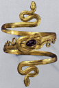 { Gold snake bracelet with garnet, from the Greek-Hellenistic period, 3rd-to-2nd century BC }