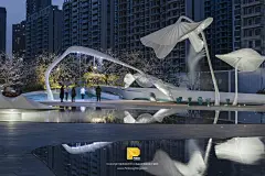 品光案例 | 南昌华侨城·万科世纪水岸鸟屿浮云-光启未来 : 夜色中景观塔透射着柔和的暖光，指引南昌城市革新发展的方向，为这座城市注入更多美好的期待和想象。