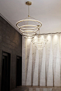 Transitional Lobby NYC | Geometric Stone Roll + Hill Lighting: 