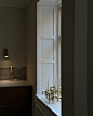 Photo shared by Rasmus Chr. Bundgaard Malling on May 07, 2024 tagging @housedoctorcom, @humdakin, and @stoffnagel. May be an image of lighting, brass, towel rack, sink, faucet and indoors.