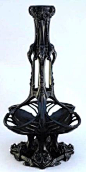 CARLO BUGATTI table lamp, c. 1907-1910, grotesque Art Nouveau forms, bronze with black finish, approx. 22 in high.