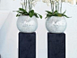 Disco Mirror Planters, planted with white Phalaenopsis Orchids and mounted on pedestals. Nature at Work