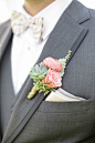 pink boutonniere with succulents