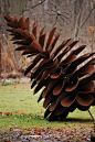 pine cone art made from old shovels: 