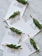 Christmas Table Placecards: Each one is decorated with Rosemary (could also use a pine sprig accent): 