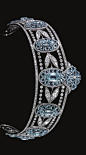 BELLE EPOQUE AQUAMARINE AND DIAMOND TIARA, CIRCA 1910 Designed as a series of graduated oval aquamarine clusters set with oval- and hexagonal-shaped aquamarines, interspersed with sprays of diamond myrtle leaves, within millegrain borders of circular-, si