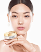 Photo by Guerlain on February 08, 2024. May be an image of 1 person, makeup, cosmetics, hand cream and text.