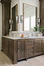 This Home Achieves That Covetable Farmhouse HGTV Look. Master bathroom.  Interior Designer: Cristi Holcombe. Photography: Rustic White Photography. See more on styleblueprint.com.
