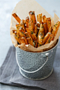 Learn the secret to crispy homemade french fries. Toss with fresh garlic, dill, and sea salt for extra flavor!