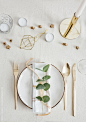 Christmas place setting with golden details