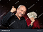 stock-photo-lucky-old-man-holding-group-of-dollar-bills-and-show-ok-sign-115780879.jpg (1500×1122)