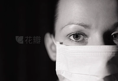 Woman doctor with a face mask