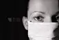 Woman doctor with a face mask