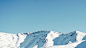snow covered mountain under blue sky during daytime