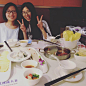 Image may contain: 2 people, people smiling, food and indoor