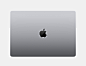 一台闭合的深空灰色 MacBook Pro 的俯视图，机身上有 Apple 标志。