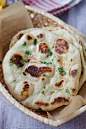 Naan bread with golden brown blisters on the surface | rasamalaysia.com