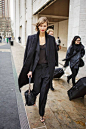 Karlie Kloss all in black with a dash of scarlet lipstick #fashionweek #streetstyle