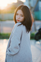 woman in gray long sleeve shirt