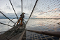 在缅甸的茵莱湖，划船的渔民和传统的捕鱼图片下载