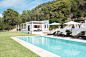 Can Ava - White Ibiza : Sitting above the retro-chic beach of Cala Vadella in the south west of the island, Can Ava is a six-bedroom luxury villa designed for adventure lovers and escapists alike. Comprised of the main villa plus two standalone guest hous