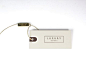 hangtag with metal gold bar engraved seal: 