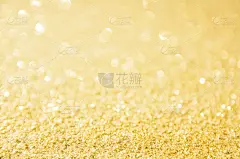 散焦金色闪光背景。金色抽象散景背景。圣诞节的抽象背景