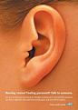 The interactive version of this NHS poster campaign uses audio and visuals to show the voice “whispering” into the woman’s ear. Via Canva.: 