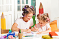 young-mother-her-little-daughter-drawing-with-pencils-home