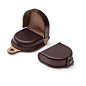 Very firm, vegetable-tanned cowhide (frame 3. 6 mm, base 2. 4 mm thick), drawn over a mandrel and sewn with open edges in... - Small Purse: 