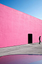 composition, contrast... the pink wall is a true contrast in comparison to the shadow of the man standing in the front right corner.: 